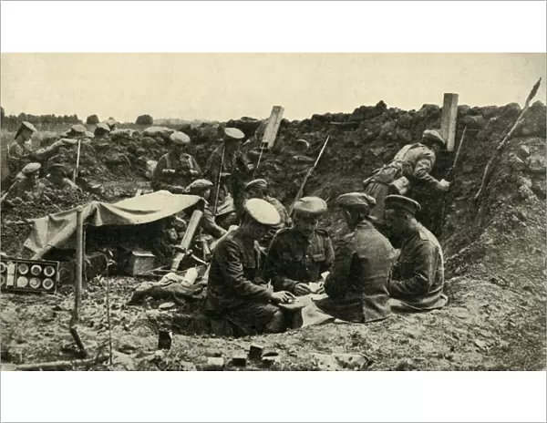 Soldiers playing cards in the trenches, First World War, c1916, (c1920). Creator: Unknown