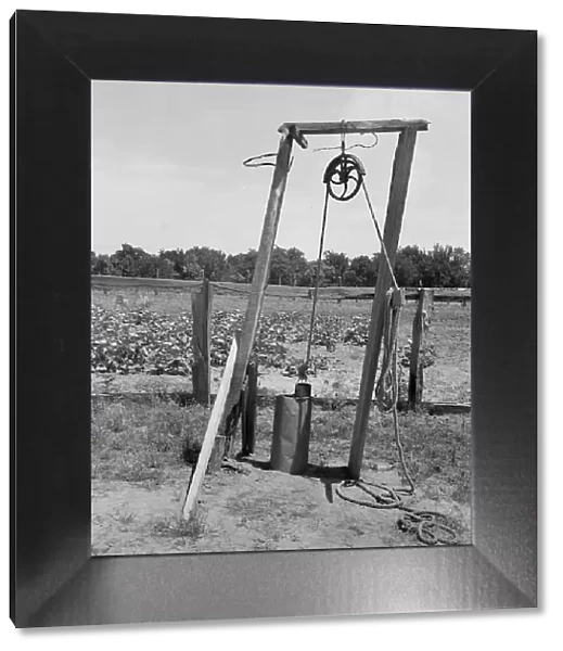 Well, Center County, Oklahoma, belonging to tenant farmer, 1937. Creator: Dorothea Lange