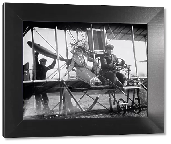 Senorita Lenore Riviero [sic] with Anthony Jannus; In Rex Smith Aeroplane, 1912. Creator: Harris & Ewing. Senorita Lenore Riviero [sic] with Anthony Jannus; In Rex Smith Aeroplane, 1912. Creator: Harris & Ewing