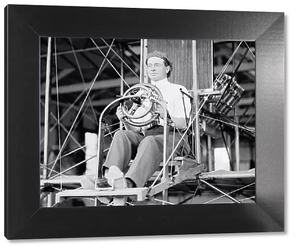 Paul Peck, Commercial Aviator - In Curtiss Type Plane; College Park, 1911. Creator: Harris & Ewing. Paul Peck, Commercial Aviator - In Curtiss Type Plane; College Park, 1911. Creator: Harris & Ewing