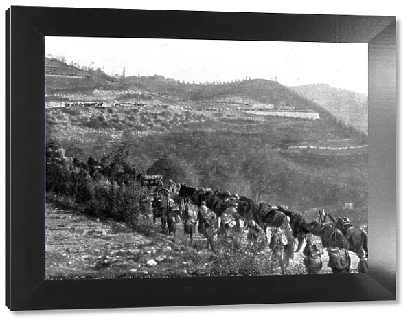 The Italians turn things around; French aid: crossing a pass, on a newly constructed.. 1917. Creator: Unknown