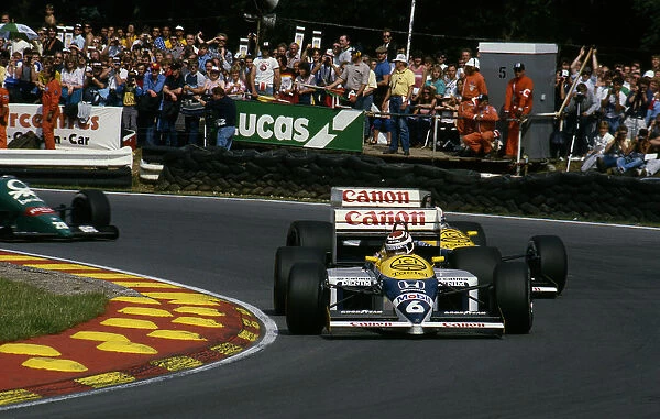 1986 British Grand Prix Ricardo Patrese leads Nigel Mansell in Williams FW11 at Brands Hatch
