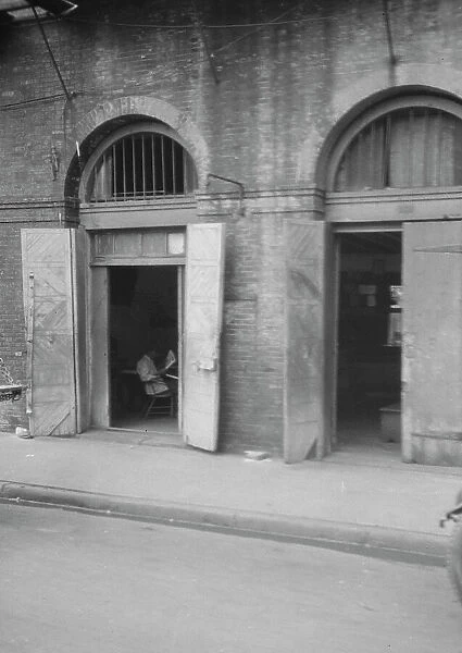 Absinthe House entrance, New Orleans, between 1920 and 1926. Creator: Arnold Genthe