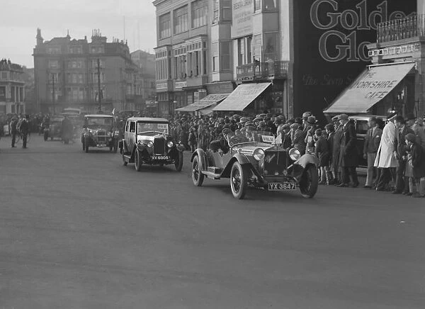 Alfa Romeo and Riley taking part in the London-Brighton Run, 1928. Artist: Bill Brunell