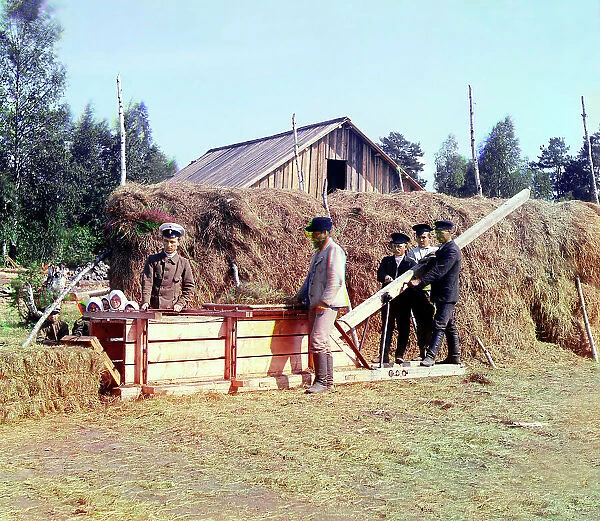 Baling machine for hay, 1915. Creator: Sergey Mikhaylovich Prokudin-Gorsky