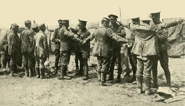 After the Battle: searching German prisoners of war... First World War, c1916, (c1920)