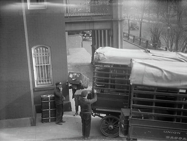 Belongings of Count J.H. Von Bernstorff being removed from the German Embassy, Washington DC, 1917. Creator: Harris & Ewing. Belongings of Count J.H. Von Bernstorff being removed from the German Embassy, Washington DC, 1917