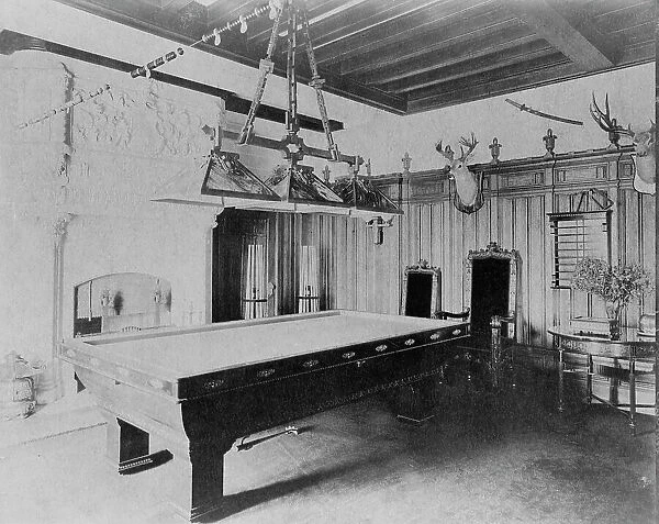Billiard room, with a deer head and an elk head, in home of Edmund... Greenwich, Connecticut, 1908. Creator: Frances Benjamin Johnston