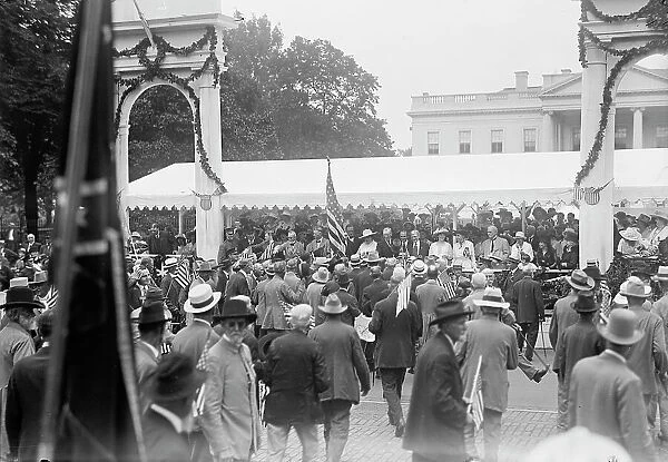 Confederate Reunion - President And Mrs. Wilson; Marshall, Etc. Reviewing Parade From Stand... 1917 Creator: Harris & Ewing. Confederate Reunion - President And Mrs. Wilson; Marshall, Etc