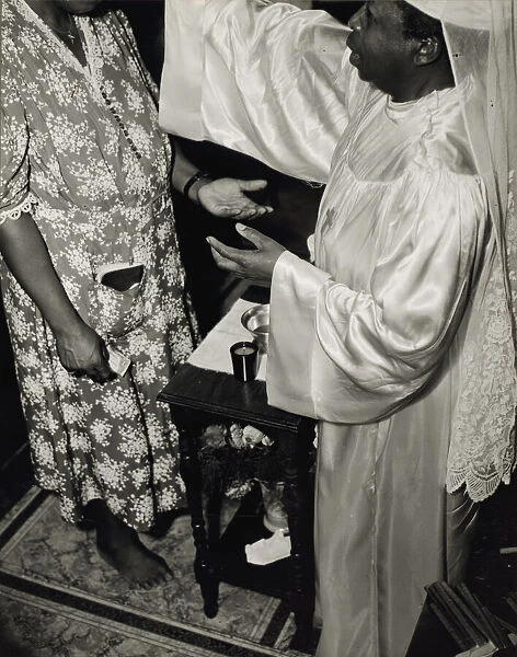 Contributions are made by all who receive the blessing and annointment... Washington, D.C. 1942. Creator: Gordon Parks