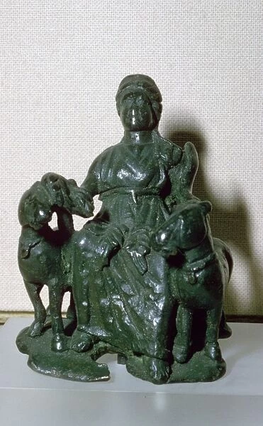 Copper alloy figure of the goddess Epona, seated between two ponies, from Wiltshire, England