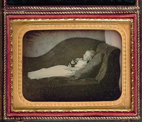 Dead Child On a Sofa, c. 1855. Creator: Unidentified Photographer