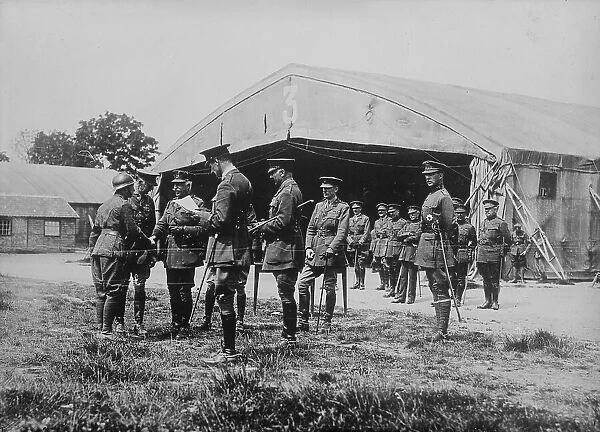 Duke of Connaught decorating a Belgian, 3 Jul 1918. Creator: Bain News Service