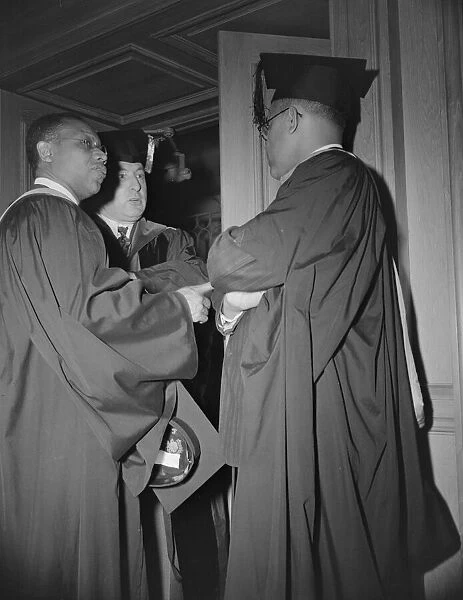 Faculty members of the Howard University during commencement, Washington, D. C, 1942. Creator: Gordon Parks