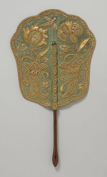 Fixed fan of green silk with straw embroidery and wooden handle, England, c.1740. Creator: Unknown