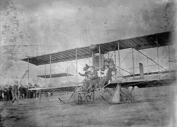 Flights And Tests of Rex Smith Plane Flown By Anthony Jannus; in plane with Miss Laura Merriam, 1912 Creator: Harris & Ewing. Flights And Tests of Rex Smith Plane Flown By Anthony Jannus; in plane with Miss Laura Merriam