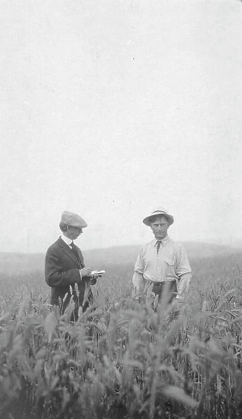 Frank G. Carpenter at an experimental farm, between c1900 and 1916. Creator: Unknown