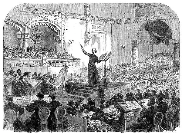 Franz Liszt conducting the performance of his new oratorio at Pesth, 1865. Creator: Unknown