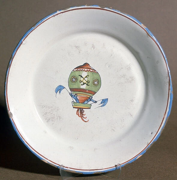 A French faience plate with aeronauts with flags, 1785