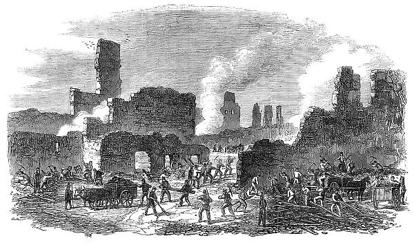 The Great Fire at Limoges, France: firemen and soldiers clearing out a portion of the ruins…, 1864. Creator: Unknown