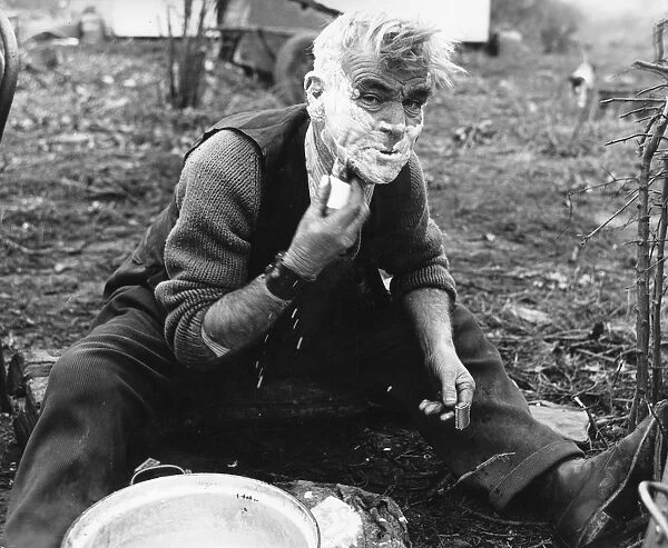 Gypsy man shaving, 1960s