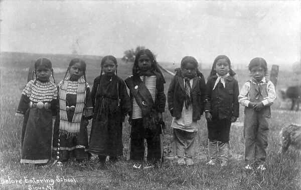 Hampton Institute, Hampton, Va. - before entering school - seven Indian children... 1899 or 1900. Creator: Frances Benjamin Johnston