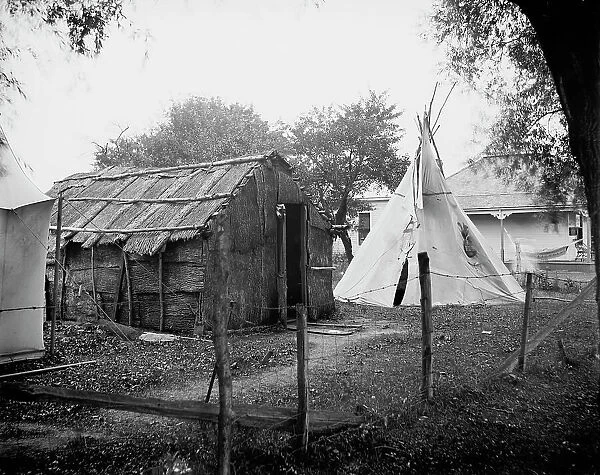 Hut and tepee, probably St. Clair Flats, Mich. between 1900 and 1920. Creator: Unknown