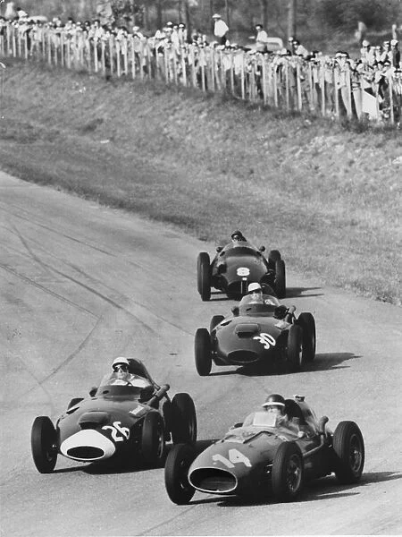 Italian Grand Prix 1958, Moss in Vanwall leads Hawthorns Ferrari. Creator: Unknown