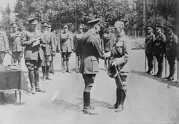 King Geo. decorates French Colonel, 7 Jul 1917. Creator: Bain News Service