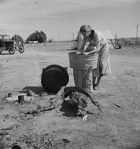 Laundry facilities in migratory labor camp, Imperial Valley, California, near Calipatria, 1937. Creator: Dorothea Lange