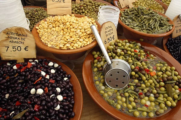 Market stall, Mallorca, Spain. Olives, beans and gherkins