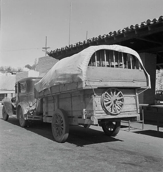 Migrant family stopped at the California-Arizona state line, Yuma, Arizona, 1937. Creator: Dorothea Lange