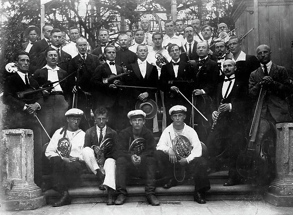 Mikhail Alekseevich Pavlov with the Members of a Symphony Orchestra, 1920s. Creator: Unknown