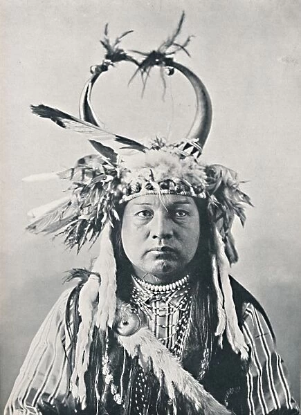 A Native American with buffalo-horns headdress, 1912. Artist: Robert Wilson Shufeldt