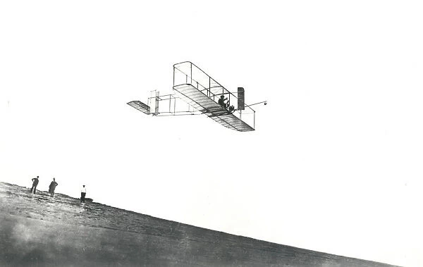 Orville Wright tests his glider at Kitty Hawk, North Carolina, USA, 1911. Creator: NASA