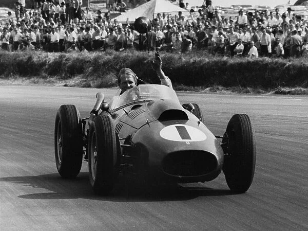 Peter Collins celebrates with lap of honour in Ferrari, 1958 British GP. Creator: Unknown