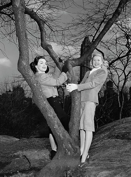 Portrait of Doris Day and Kitty Kallen, Central Park, New York, N.Y. ca. Apr. 1947. Creator: William Paul Gottlieb