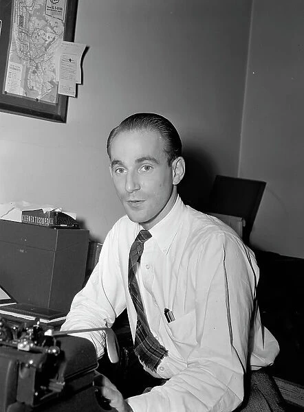 Portrait of Mike Levin, Down Beat office, New York, N.Y. ca. 1947. Creator: William Paul Gottlieb