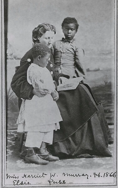 Portrait of Sea Island School teacher Miss Harriet W. Murray, with students Elsie and Puss, 1866-02. Creator: Unknown