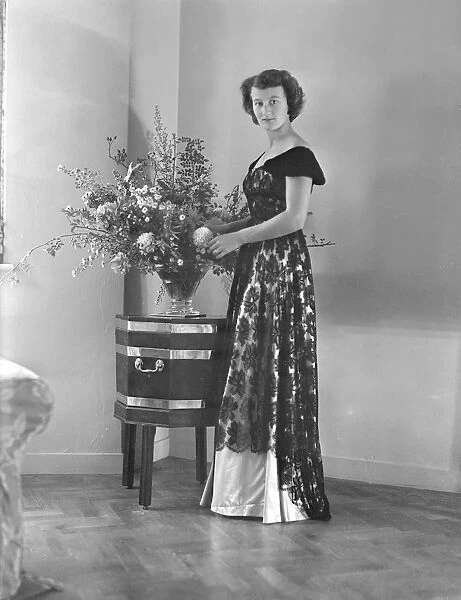 Portrait of woman in evening dress, (Isle of Wight?), c1935. Creator: Kirk & Sons of Cowes