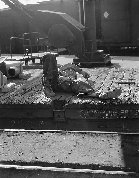 Scene in railroad yard, Sacramento, California, 1936. Creator: Dorothea Lange