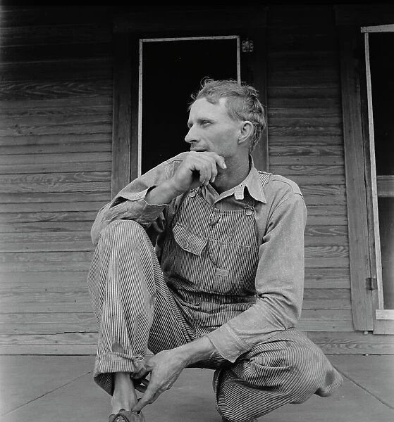 Tractor driver on cotton farm near Memphis, Texas, 1937. Creator: Dorothea Lange