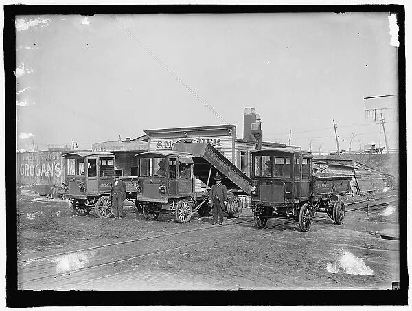 Three trucks: S.M. Frazier, between 1909 and 1914. Creator: Harris & Ewing. Three trucks: S.M. Frazier, between 1909 and 1914. Creator: Harris & Ewing