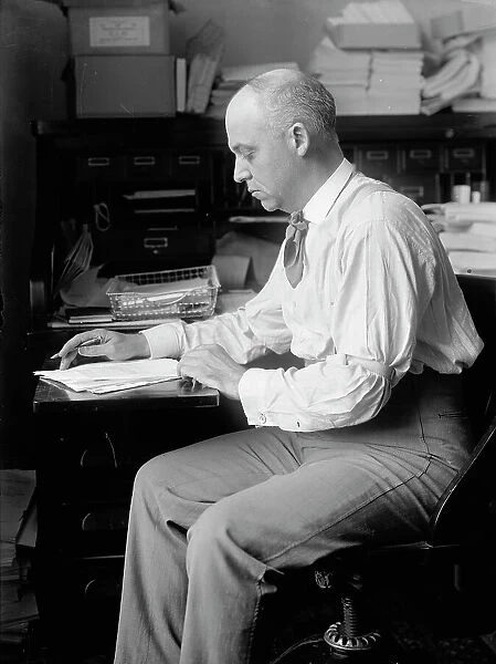 Unknown politician at desk, 1912. Creator: Harris & Ewing. Unknown politician at desk, 1912. Creator: Harris & Ewing
