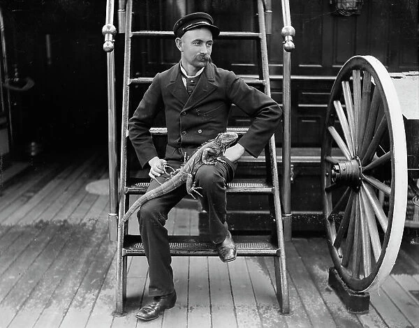 U.S.S. New York, Admiral Sampson's steward and his pet, between 1893 and 1901. Creator: Edward H Hart