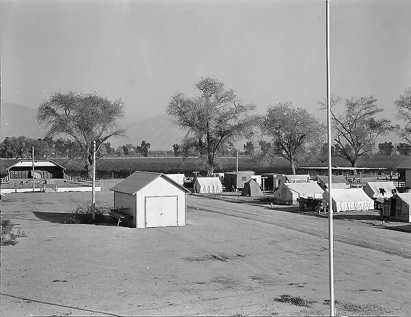 View of Kern migrant camp, community center at left, California, 1936. Creator: Dorothea Lange