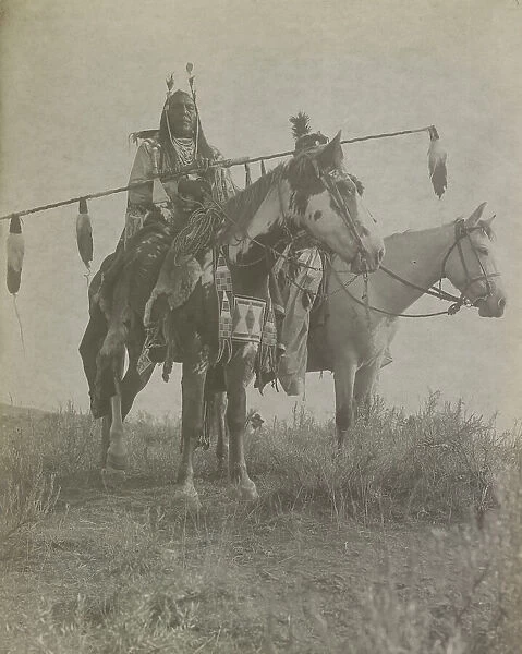 Village criers on horseback, Bird On the Ground and Forked Iron, Crow Indians, Montana, c1908. Creator: Edward Sheriff Curtis