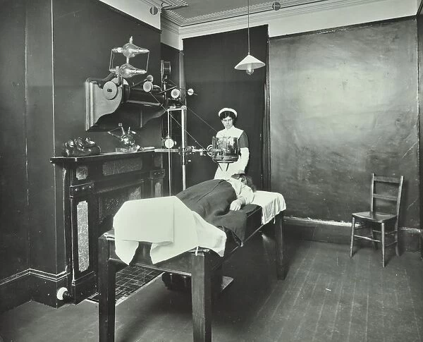 X-ray room, Fulham School treatment centre, London, 1914
