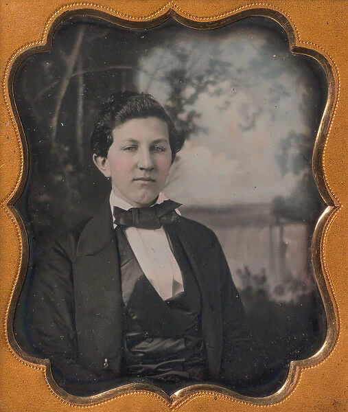 Young Man Seated in Front of Painted Outdoor Backdrop, 1850s. Creator: Unknown