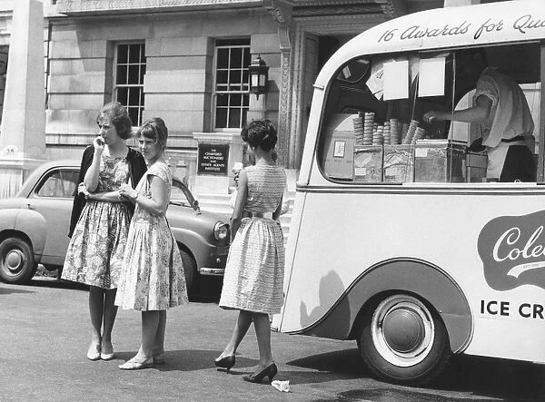 Young women by an ice cream van, c1960